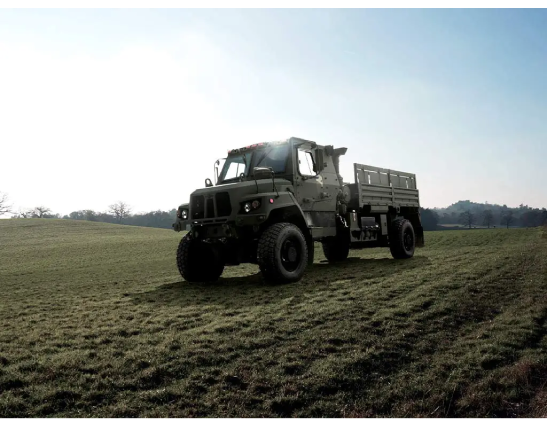 carc green FM100 (1) Truck parked in a field
